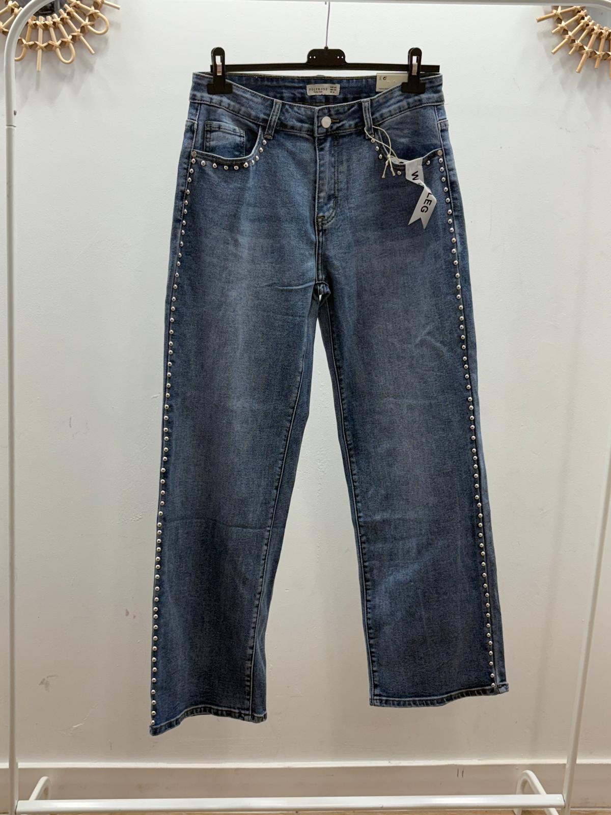 pantalón denim tachuelas